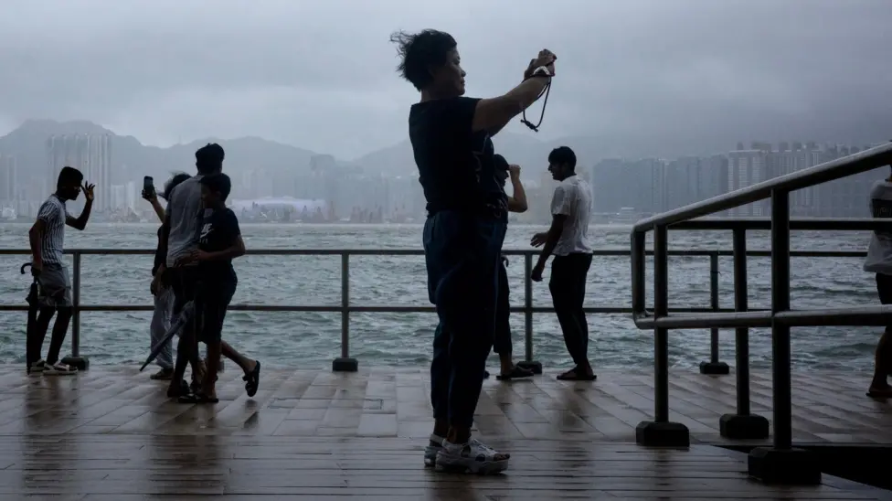 Howling winds, sheets of rain In eye of a typhoon Ragasa in China