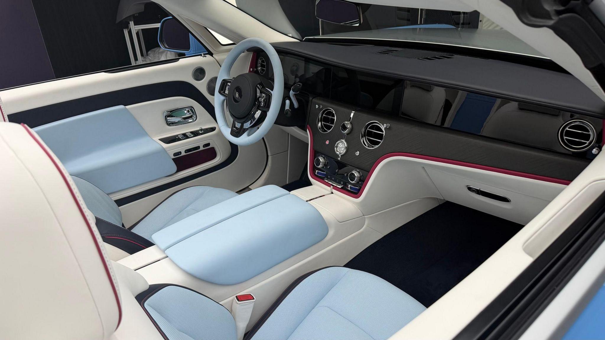 The interior of a two-seat Rolls-Royce convertible. 